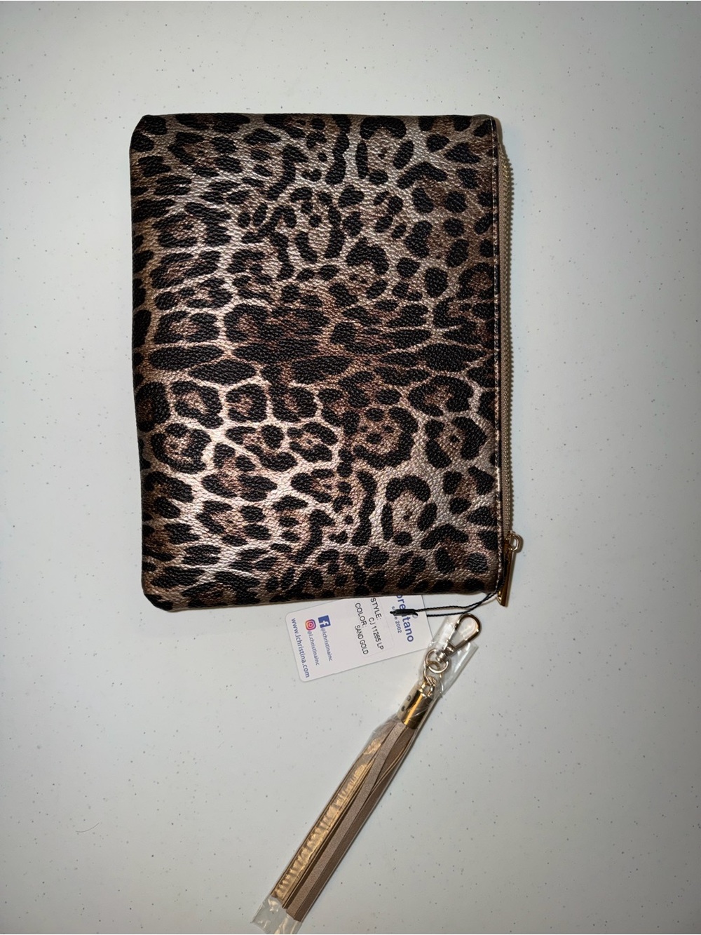 Brentano Leopard Print Clutch Bag featuring a metallic "Sand Gold"